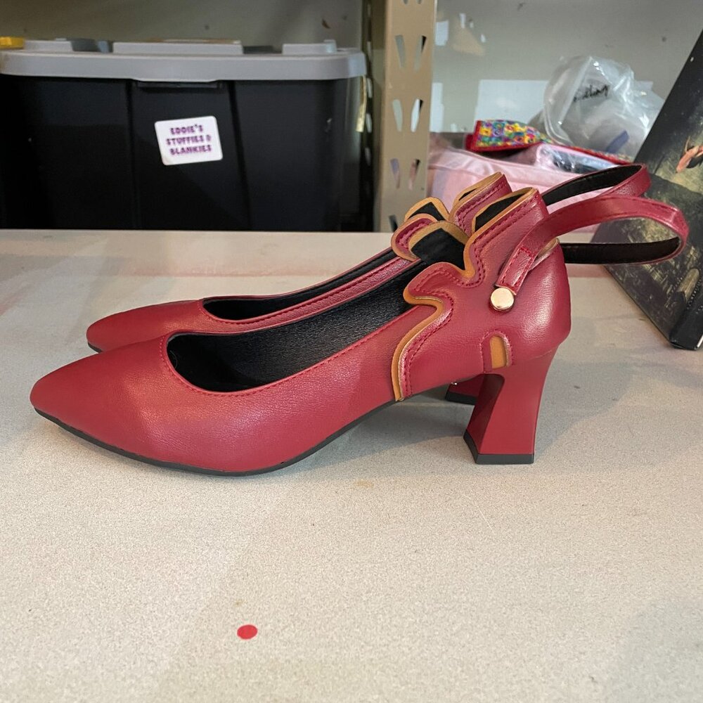 Brand New Red Heels! Cute floral detail on back. Size 11